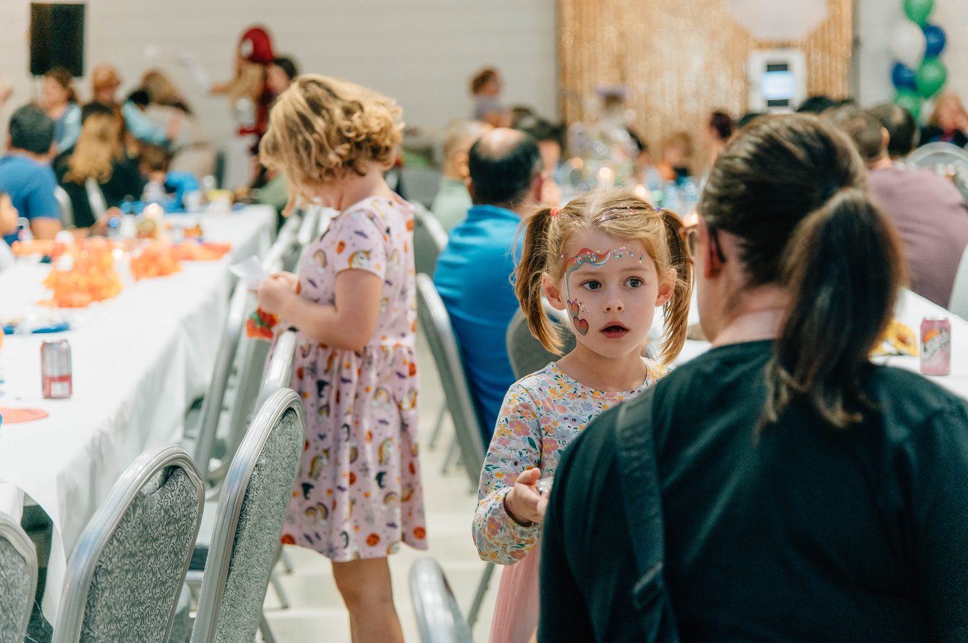 Children with face paint at the annual Norwood Dental Centre Karaoke Jamboree