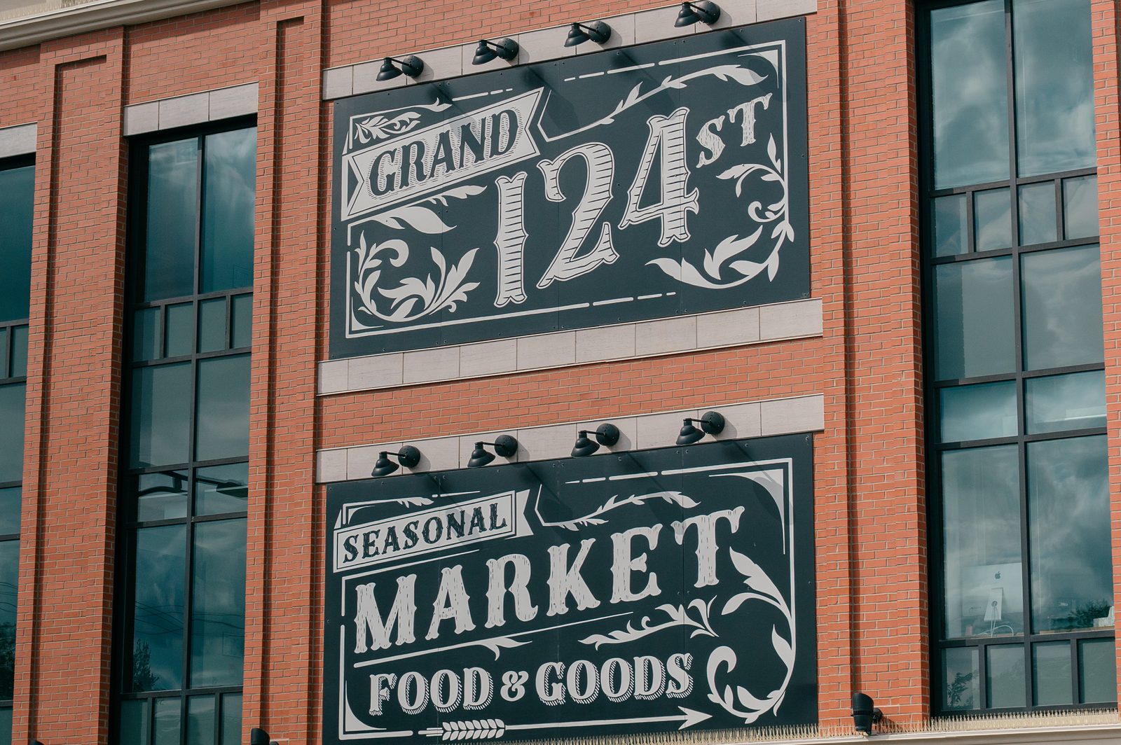 The Grand 124 Street Market signage on 124 Street, around the corner from the Inglewood clinic